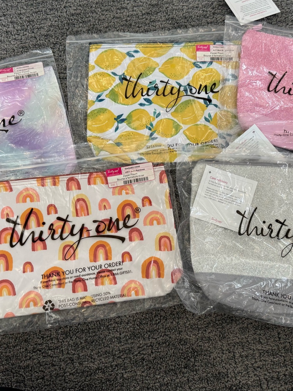 NEW thirty-one zipper pouches set of 6)